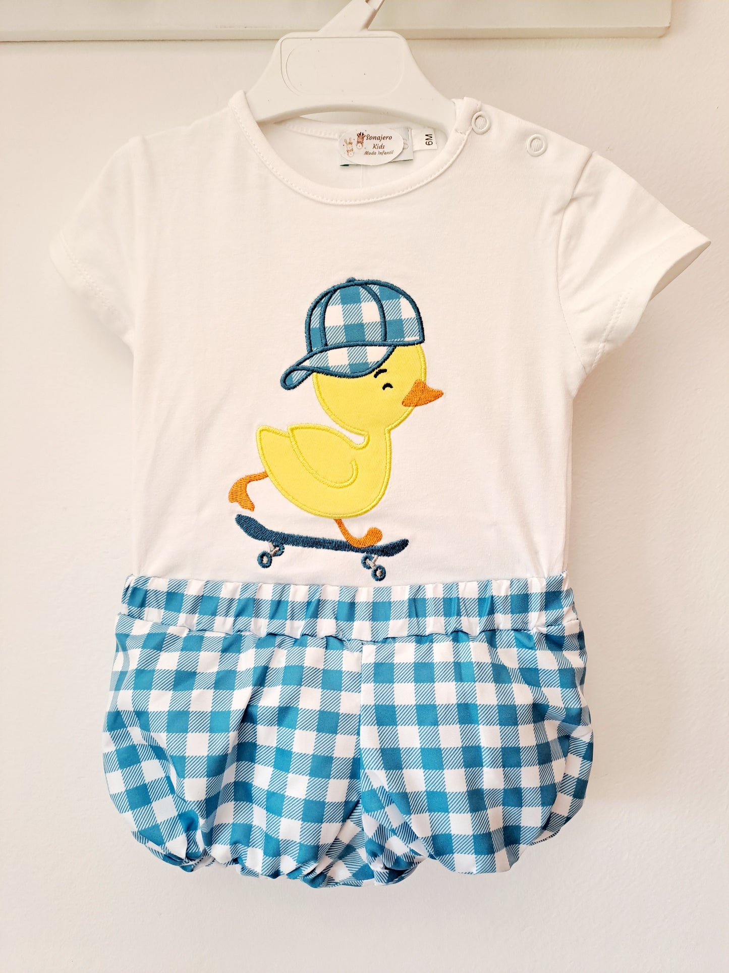 Conjunto Niño Pato Monopatin