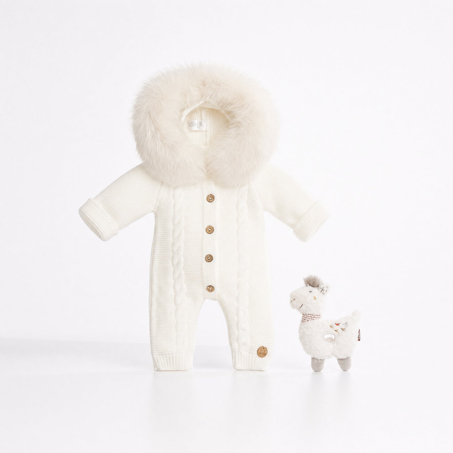 Buzo de Punto Pangasa Baby Marfil con Pelo | Sonajero Kids